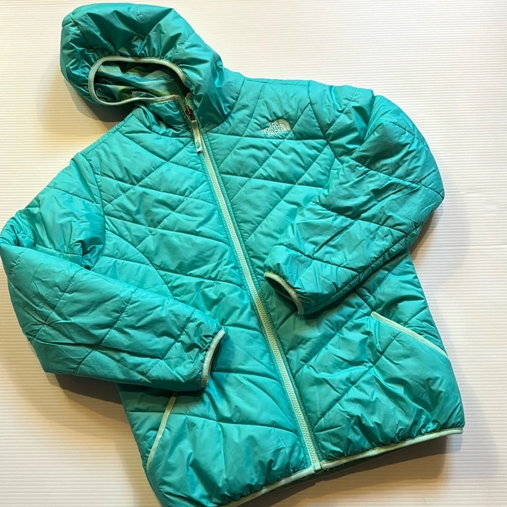 The North Face reversible puffers jacket.  Green, yellow, white swirl. Girls XL